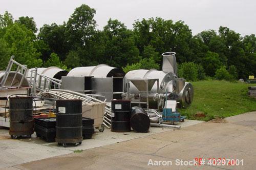 Used Niro spray tower/spray dryer. 23' diameter x 41' tall, 304 stainless steel construction. Main chamber is double walled and insulated. Unit has a fluid bed unit with three steam coil heater units...