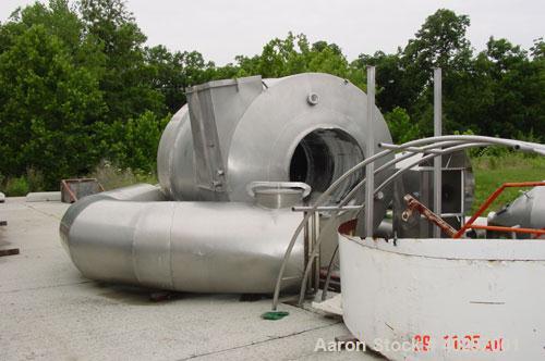 Used Niro spray tower/spray dryer. 23' diameter x 41' tall, 304 stainless steel construction. Main chamber is double walled and insulated. Unit has a fluid bed unit with three steam coil heater units...