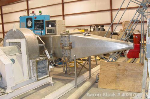 Used Niro spray tower/spray dryer. 23' diameter x 41' tall, 304 stainless steel construction. Main chamber is double walled and insulated. Unit has a fluid bed unit with three steam coil heater units...