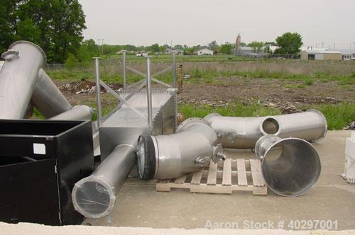 Used Niro spray tower/spray dryer. 23' diameter x 41' tall, 304 stainless steel construction. Main chamber is double walled and insulated. Unit has a fluid bed unit with three steam coil heater units...