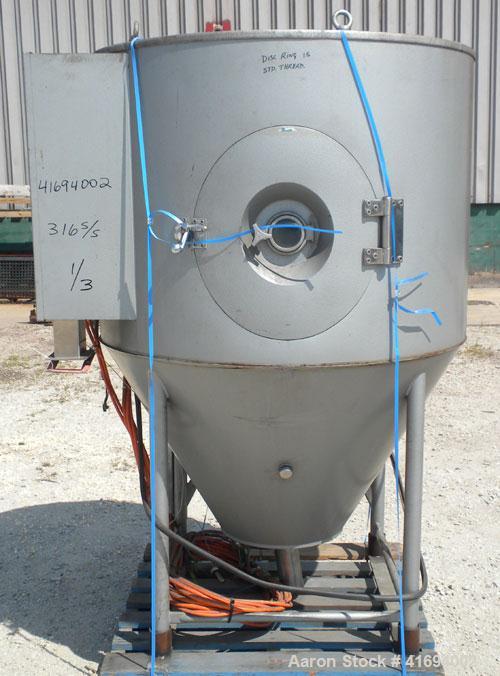Used Niro Versitile Utility Spray Dryer, model V, 316 stainless steel. Up to 10 to 15 kilograms an hour (22-33#) evaporation capacity. Electrically heated chamber 48" diameter x 30" straight side x 3...