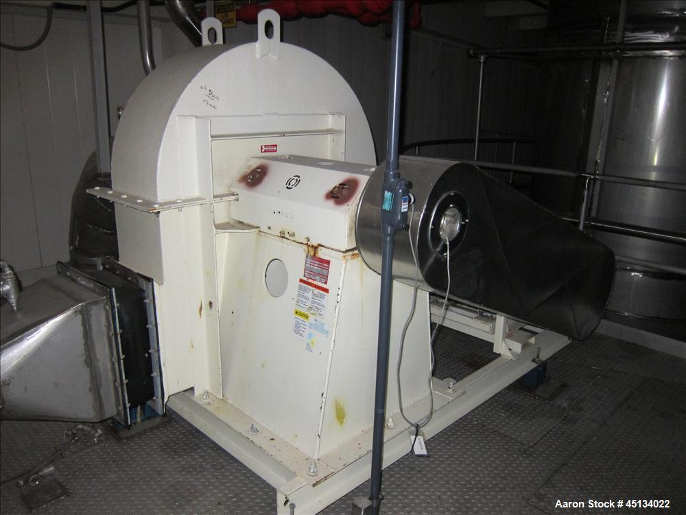 Used Niro Spray Tower Dryer. Originally designed for 12,500 pounds / hour of water evaporation. The dryer capacity was increased to 15,000 pounds / hour at 65,000 SCFM of air flow.  The Dryer is constructed of 316 L Stainless Steel. The dryer is a Standard Tall Form Dryer equipped with an integral static Fluid Bed Dryer and external Vibratory Fluid Bed Cooler. Both beds have heaters and the VFB also had a Cooler. The Dryer was equipped with fines return and agglomeration capabilities as an opti