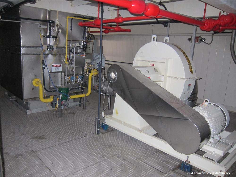 Used Niro Spray Tower Dryer. Originally designed for 12,500 pounds / hour of water evaporation. The dryer capacity was increased to 15,000 pounds / hour at 65,000 SCFM of air flow.  The Dryer is constructed of 316 L Stainless Steel. The dryer is a Standard Tall Form Dryer equipped with an integral static Fluid Bed Dryer and external Vibratory Fluid Bed Cooler. Both beds have heaters and the VFB also had a Cooler. The Dryer was equipped with fines return and agglomeration capabilities as an opti
