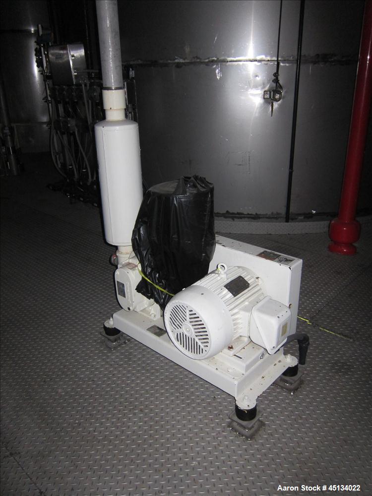 Used Niro Spray Tower Dryer. Originally designed for 12,500 pounds / hour of water evaporation. The dryer capacity was increased to 15,000 pounds / hour at 65,000 SCFM of air flow.  The Dryer is constructed of 316 L Stainless Steel. The dryer is a Standard Tall Form Dryer equipped with an integral static Fluid Bed Dryer and external Vibratory Fluid Bed Cooler. Both beds have heaters and the VFB also had a Cooler. The Dryer was equipped with fines return and agglomeration capabilities as an opti
