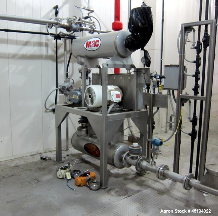 Used Niro Spray Tower Dryer. Originally designed for 12,500 pounds / hour of water evaporation. The dryer capacity was increased to 15,000 pounds / hour at 65,000 SCFM of air flow.  The Dryer is constructed of 316 L Stainless Steel. The dryer is a Standard Tall Form Dryer equipped with an integral static Fluid Bed Dryer and external Vibratory Fluid Bed Cooler. Both beds have heaters and the VFB also had a Cooler. The Dryer was equipped with fines return and agglomeration capabilities as an opti