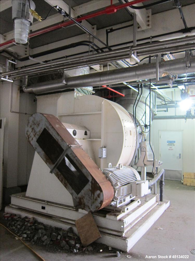 Used Niro Spray Tower Dryer. Originally designed for 12,500 pounds / hour of water evaporation. The dryer capacity was increased to 15,000 pounds / hour at 65,000 SCFM of air flow.  The Dryer is constructed of 316 L Stainless Steel. The dryer is a Standard Tall Form Dryer equipped with an integral static Fluid Bed Dryer and external Vibratory Fluid Bed Cooler. Both beds have heaters and the VFB also had a Cooler. The Dryer was equipped with fines return and agglomeration capabilities as an opti