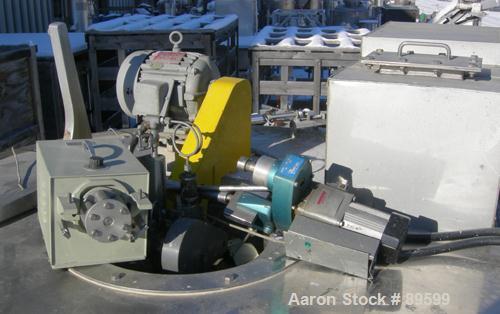 Used Ohkawara style Spray Dryer, 304 stainless steel. Electrically heated chamber 63" diameter x 33" straight side x 26" coned bottom, missing clamp-on bottom outlet section. Top mounted atomizer, no...