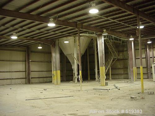 USED: Sacmi spray dryer, model ATM 36. Approximately 14' diameter x20' high with 10' cone. Still installed inside. Year 1999.