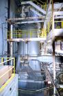 Used Damrow Drying System Stainless Steel. Approximate capacity 4,000 pounds per hour of powder with 5% moisture Whey capacity out. Consists of: (1) Spray Dryer, Stainless Steel. (7) Top entering noz...
