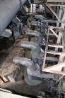 Used Damrow Drying System Stainless Steel. Approximate capacity 4,000 pounds per hour of powder with 5% moisture Whey capacity out. Consists of: (1) Spray Dryer, Stainless Steel. (7) Top entering noz...