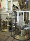 Used Niro Pharma spray dryer, model PSD-4, all stainless steel construction. The dryer is rated for 62 Kilos/ hour - 30% Solids.  Includes supply fan, process heater, receiver, condenser, primary cyc...