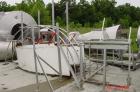 Used Niro spray tower/spray dryer. 23' diameter x 41' tall, 304 stainless steel construction. Main chamber is double walled and insulated. Unit has a fluid bed unit with three steam coil heater units...