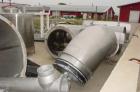 Used Niro spray tower/spray dryer. 23' diameter x 41' tall, 304 stainless steel construction. Main chamber is double walled and insulated. Unit has a fluid bed unit with three steam coil heater units...