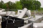Used Niro spray tower/spray dryer. 23' diameter x 41' tall, 304 stainless steel construction. Main chamber is double walled and insulated. Unit has a fluid bed unit with three steam coil heater units...