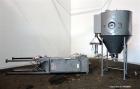 Used Niro Versatile Utility Spray Dryer, 316 Stainless Steel. Up to 10 to 15 kilograms an hour (22 to 33 pounds) evaporation capacity. Gas fired air heated chamber 48