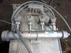 Used Niro Versatile Utility Spray Dryer, 316 Stainless Steel. Up to 10 to 15 kilograms an hour (22 to 33 pounds) evaporation capacity. Gas fired air heated chamber 48
