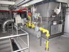 Used Niro Spray Tower Dryer. Originally designed for 12,500 pounds / hour of water evaporation. The dryer capacity was increased to 15,000 pounds / hour at 65,000 SCFM of air flow.  The Dryer is constructed of 316 L Stainless Steel. The dryer is a Standard Tall Form Dryer equipped with an integral static Fluid Bed Dryer and external Vibratory Fluid Bed Cooler. Both beds have heaters and the VFB also had a Cooler. The Dryer was equipped with fines return and agglomeration capabilities as an opti