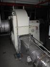 Used Niro Spray Tower Dryer. Originally designed for 12,500 pounds / hour of water evaporation. The dryer capacity was increased to 15,000 pounds / hour at 65,000 SCFM of air flow.  The Dryer is constructed of 316 L Stainless Steel. The dryer is a Standard Tall Form Dryer equipped with an integral static Fluid Bed Dryer and external Vibratory Fluid Bed Cooler. Both beds have heaters and the VFB also had a Cooler. The Dryer was equipped with fines return and agglomeration capabilities as an opti