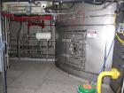 Used Niro Spray Tower Dryer. Originally designed for 12,500 pounds / hour of water evaporation. The dryer capacity was increased to 15,000 pounds / hour at 65,000 SCFM of air flow.  The Dryer is constructed of 316 L Stainless Steel. The dryer is a Standard Tall Form Dryer equipped with an integral static Fluid Bed Dryer and external Vibratory Fluid Bed Cooler. Both beds have heaters and the VFB also had a Cooler. The Dryer was equipped with fines return and agglomeration capabilities as an opti