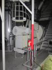 Used Niro Spray Tower Dryer. Originally designed for 12,500 pounds / hour of water evaporation. The dryer capacity was increased to 15,000 pounds / hour at 65,000 SCFM of air flow.  The Dryer is constructed of 316 L Stainless Steel. The dryer is a Standard Tall Form Dryer equipped with an integral static Fluid Bed Dryer and external Vibratory Fluid Bed Cooler. Both beds have heaters and the VFB also had a Cooler. The Dryer was equipped with fines return and agglomeration capabilities as an opti