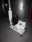 Used Niro Spray Tower Dryer. Originally designed for 12,500 pounds / hour of water evaporation. The dryer capacity was increased to 15,000 pounds / hour at 65,000 SCFM of air flow.  The Dryer is constructed of 316 L Stainless Steel. The dryer is a Standard Tall Form Dryer equipped with an integral static Fluid Bed Dryer and external Vibratory Fluid Bed Cooler. Both beds have heaters and the VFB also had a Cooler. The Dryer was equipped with fines return and agglomeration capabilities as an opti
