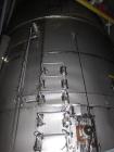 Used Niro Spray Tower Dryer. Originally designed for 12,500 pounds / hour of water evaporation. The dryer capacity was increased to 15,000 pounds / hour at 65,000 SCFM of air flow.  The Dryer is constructed of 316 L Stainless Steel. The dryer is a Standard Tall Form Dryer equipped with an integral static Fluid Bed Dryer and external Vibratory Fluid Bed Cooler. Both beds have heaters and the VFB also had a Cooler. The Dryer was equipped with fines return and agglomeration capabilities as an opti