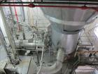 Used Niro Spray Tower Dryer. Originally designed for 12,500 pounds / hour of water evaporation. The dryer capacity was increased to 15,000 pounds / hour at 65,000 SCFM of air flow.  The Dryer is constructed of 316 L Stainless Steel. The dryer is a Standard Tall Form Dryer equipped with an integral static Fluid Bed Dryer and external Vibratory Fluid Bed Cooler. Both beds have heaters and the VFB also had a Cooler. The Dryer was equipped with fines return and agglomeration capabilities as an opti