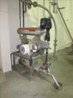 Used Niro Spray Tower Dryer. Originally designed for 12,500 pounds / hour of water evaporation. The dryer capacity was increased to 15,000 pounds / hour at 65,000 SCFM of air flow.  The Dryer is constructed of 316 L Stainless Steel. The dryer is a Standard Tall Form Dryer equipped with an integral static Fluid Bed Dryer and external Vibratory Fluid Bed Cooler. Both beds have heaters and the VFB also had a Cooler. The Dryer was equipped with fines return and agglomeration capabilities as an opti