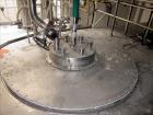 Used Niro Spray Tower Dryer. Originally designed for 12,500 pounds / hour of water evaporation. The dryer capacity was increased to 15,000 pounds / hour at 65,000 SCFM of air flow.  The Dryer is constructed of 316 L Stainless Steel. The dryer is a Standard Tall Form Dryer equipped with an integral static Fluid Bed Dryer and external Vibratory Fluid Bed Cooler. Both beds have heaters and the VFB also had a Cooler. The Dryer was equipped with fines return and agglomeration capabilities as an opti