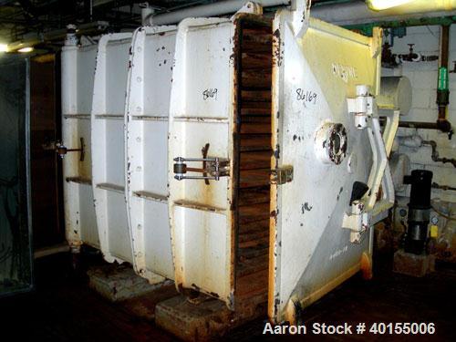 Used:  Devine vacuum shelf dryer, 451.70 square feet, carbon steel. (15) 58" wide x 78-3/4" deep x 1-1/4" thick jacketed shelves, 14 usable. 3-5/8" spacing between shelves. Approximate chamber 6' wid...