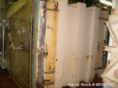 Used:  Vacuum shelf dryer, approximately 451.70 square feet, carbon steel. Two hinged doors with sight glass.