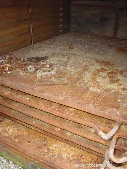 USED: Devine No 28 vacuum shelf dryer, 613 sq ft, cast iron body.Chamber 60" wide x 69" high x 84" deep, rated full vacuum. 10 shelves59" wide x 78-3/4" deep, rated approx 30 psi. 2-5/16" spacing bet...