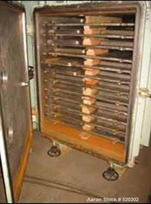 USED: 136 sq ft J P Devine stainless steel vacuum shelf dryer. (12) 39" x 42" 316 stainless steel shelves rated 30 psi, 3" shelf spacing, 316 stainless steel lined door and chamber, swing away door w...