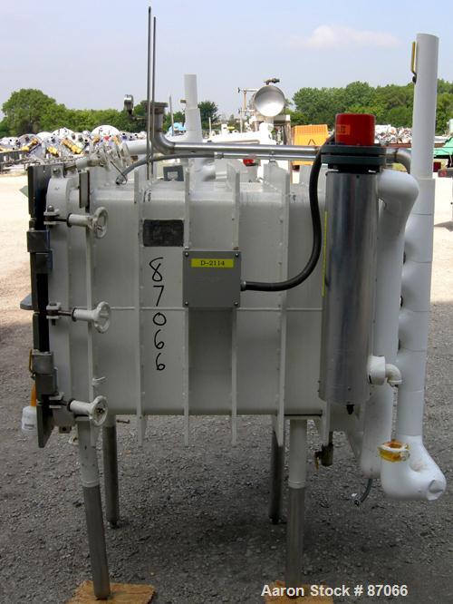 USED: Hull Corp vacuum shelf dryer, approximate 20 square feet. 316 stainless steel chamber 30" wide x 29" high x 41" deep, rated 25 psi at 350 deg F. (4) 24" wide x 36" deep x 1" thick jacketed 316 ...