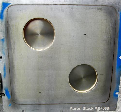 USED: Hull Corp vacuum shelf dryer, approximate 20 square feet. 316 stainless steel chamber 30" wide x 29" high x 41" deep, rated 25 psi at 350 deg F. (4) 24" wide x 36" deep x 1" thick jacketed 316 ...