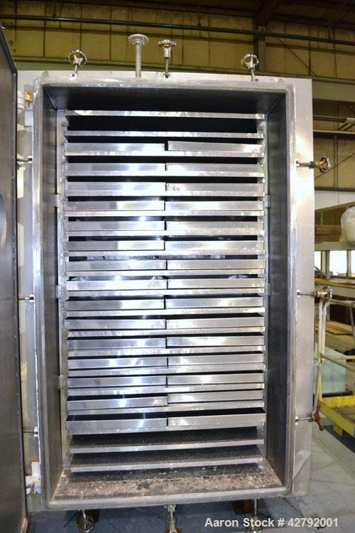 Used Hull Vacuum Shelf Dryer, Model 10GS20, Approximately 350 Square Feet. (19) 309 Stainless U stamped jacketed shelves 44" wide x 58-3/4" deep x 1" thick rated 50 psi at 300 deg.f.. 3-1/4" Spacing ...