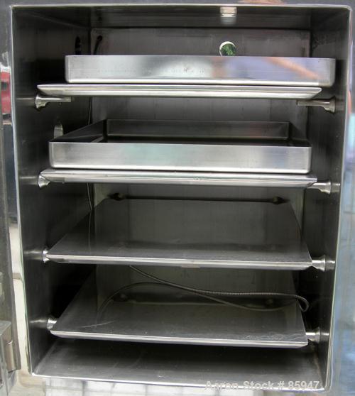 USED: Italvacuum vacuum shelf dryer, model EO2, approximately 9 square feet, 316 stainless steel. (4) 19-3/8" wide x 19-3/8" deep x 1" thick jacketed shelves, 5-1/4" spacing between shelves. Chamber ...