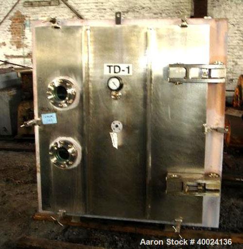 Used United McGill Vacuum Shelf Dryer. Model 11F.  Approximately 224.40 square feet. Chamber 60" wide x 69" tall x 47" deep. (15) 316 stainless steel shelves (14 usable) coated with "plasite" phenoli...