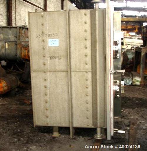 Used United McGill Vacuum Shelf Dryer. Model 11F.  Approximately 224.40 square feet. Chamber 60" wide x 69" tall x 47" deep. (15) 316 stainless steel shelves (14 usable) coated with "plasite" phenoli...