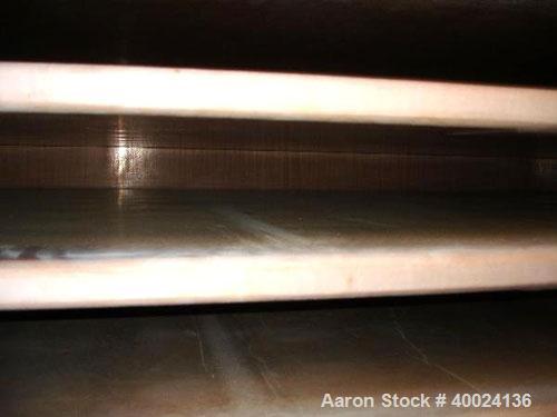 Used United McGill Vacuum Shelf Dryer. Model 11F.  Approximately 224.40 square feet. Chamber 60" wide x 69" tall x 47" deep. (15) 316 stainless steel shelves (14 usable) coated with "plasite" phenoli...