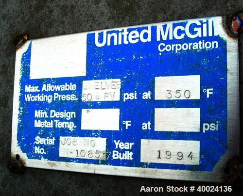 Used United McGill Vacuum Shelf Dryer. Model 11F.  Approximately 224.40 square feet. Chamber 60" wide x 69" tall x 47" deep. (15) 316 stainless steel shelves (14 usable) coated with "plasite" phenoli...