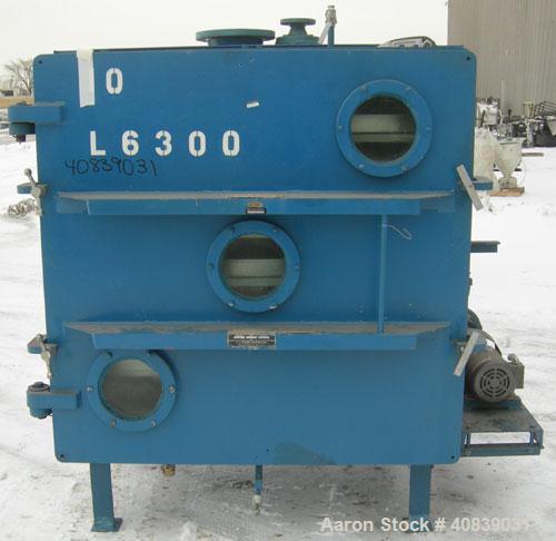Used Stokes Vacuum Shelf Dryer, Model 338-H, Approximately 73.3 Square Feet, Carbon Steel. (6) 44" Wide x 40" deep x 1" thick jacketed shelves, (5) 304 stainless steel. 5-1/2" spacing between shelves...