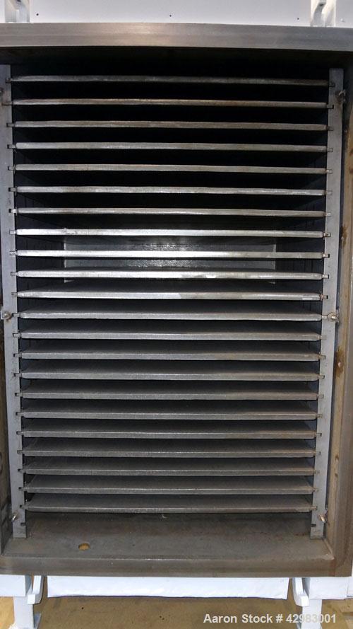 Used Stokes Vacuum Shelf Dryer, Model 338J-22. Approximately 268.8 square feet shelf area, 304 stainless steel. (22) 44" wide x 40" deep x 3/4" thick 304 stainless steel shelves, rated 50 psi at 650 ...