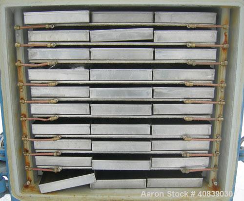Used Stokes Vacuum Shelf Dryer, Approximately 109.8 Square Feet, Carbon Steel. (9) 44" Wide x 40" deep x 1/2" thick jacketed shelves, 3-3/4" spacing between shelves. Shelves rated 50 psi. Chamber app...