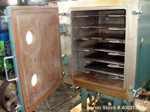 Used United McGill Vacuum Shelf Dryer, Model 3B, approximately 28 square feet, stainless steel. (6) 29" wide x 23 1/2" deep X 3.375" spaced dimple jacketed shelves. Chamber 30" wide x 37" deep x 30" ...