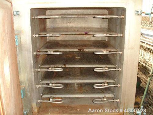 Used United McGill Vacuum Shelf Dryer, Model 3B, approximately 28 square feet, stainless steel. (6) 29" wide x 23 1/2" deep X 3.375" spaced dimple jacketed shelves. Chamber 30" wide x 37" deep x 30" ...