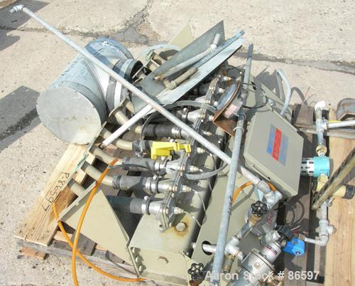 Used DCE Dalamatic Automatic Reverse Jet Cased Dust Collector, Model DLM 1/2/15. 320 square feet filter area. Carbon steel housing measures 40" x 57" x 90" long. Includes bottom hopper, stand and a N...