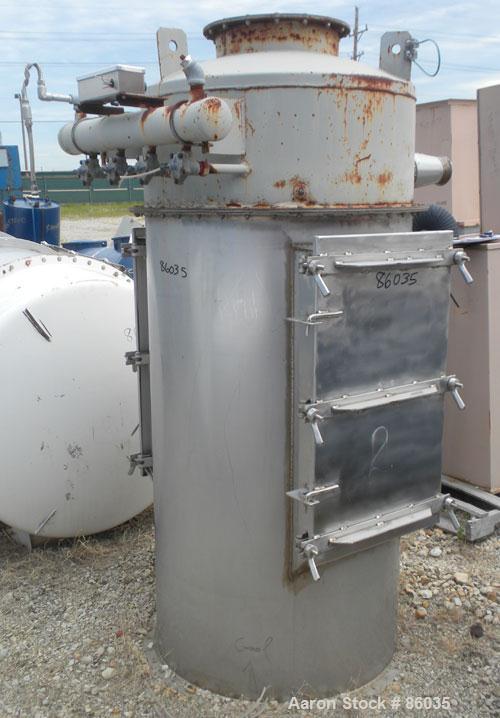 Used Flex-Kleen Bin Vent Dust Collector, Model 58CT14-II, 304 Stainless Steel. Approximate 102 square feet filter area. Housing measures approximately 36" diameter x 62" deep. Unit requires (14) appr...
