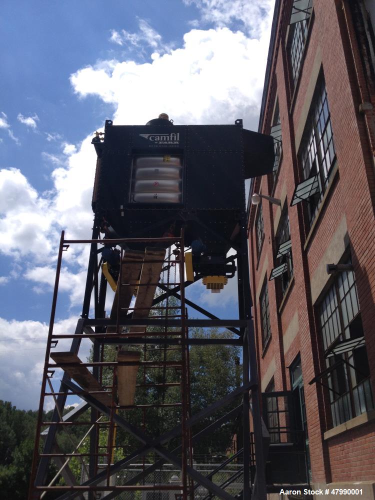 Used Camfil Farr Dust Collector, Model GS6. up to 4,000 cfm. (4) Cartridges mounted in a symmetrical frame. Features: waste collection drum. Automatic cleaning control module. 15kw heavy duty fan, ve...