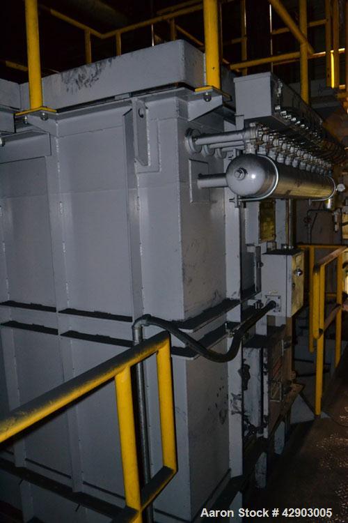 Used Nippon Pneumatic Pulse Jet Dust Collector, Model PBF-50, 538 Square Filter Area. Carbon steel housing 60" wide x 60" long x 66" tall, 12" top plenum, coned bottom. Oval type bags and cages, side...